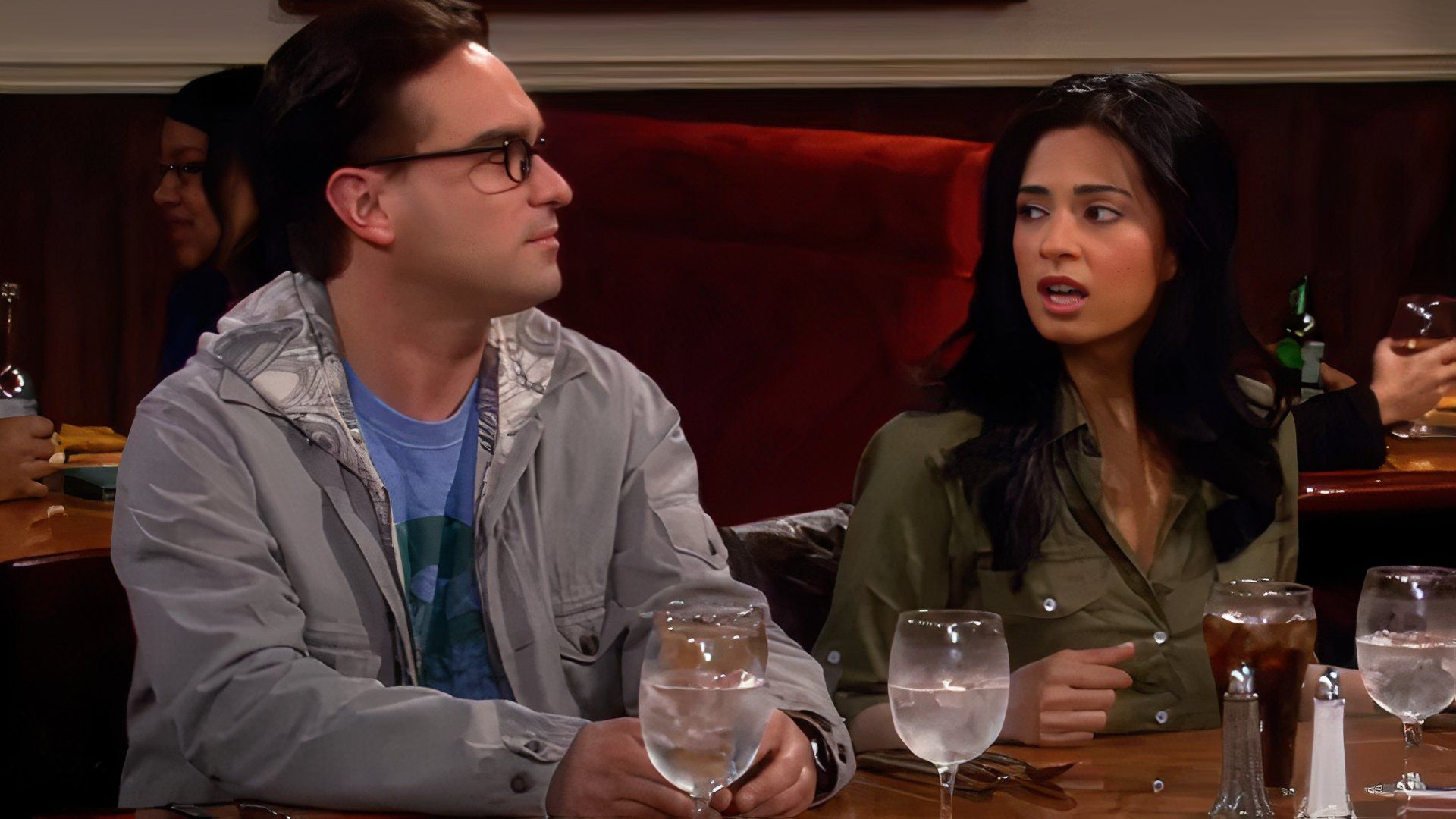 A still of Johnny Galecki and Aarti Mann as Leonard and Priya in The Big Bang Threory