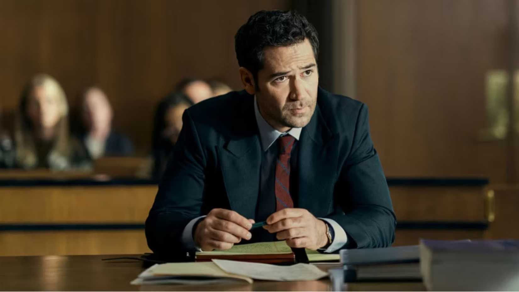 Miguel behind a desk in court on The Lincoln Lawyer