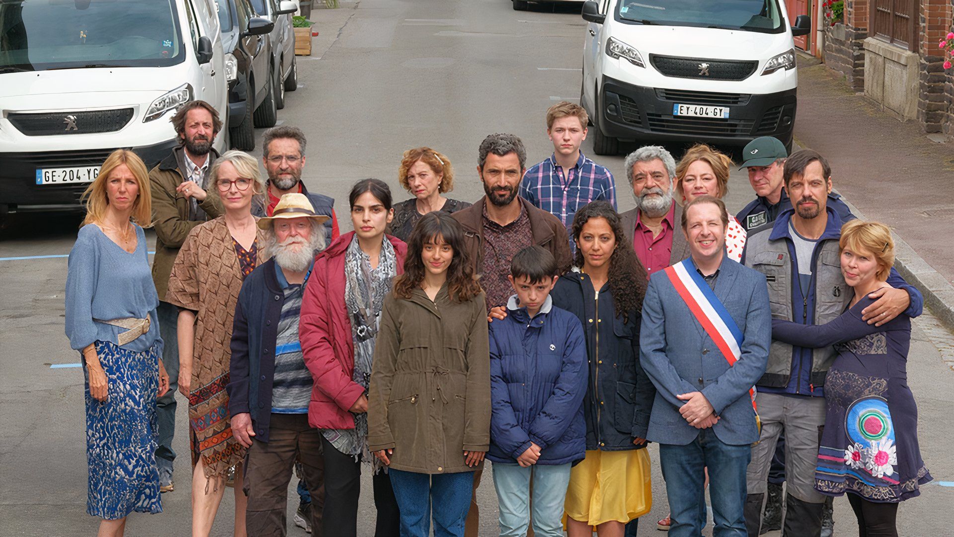 People in the street in Delpy movie Meet the Barbarians at TIFF 2024