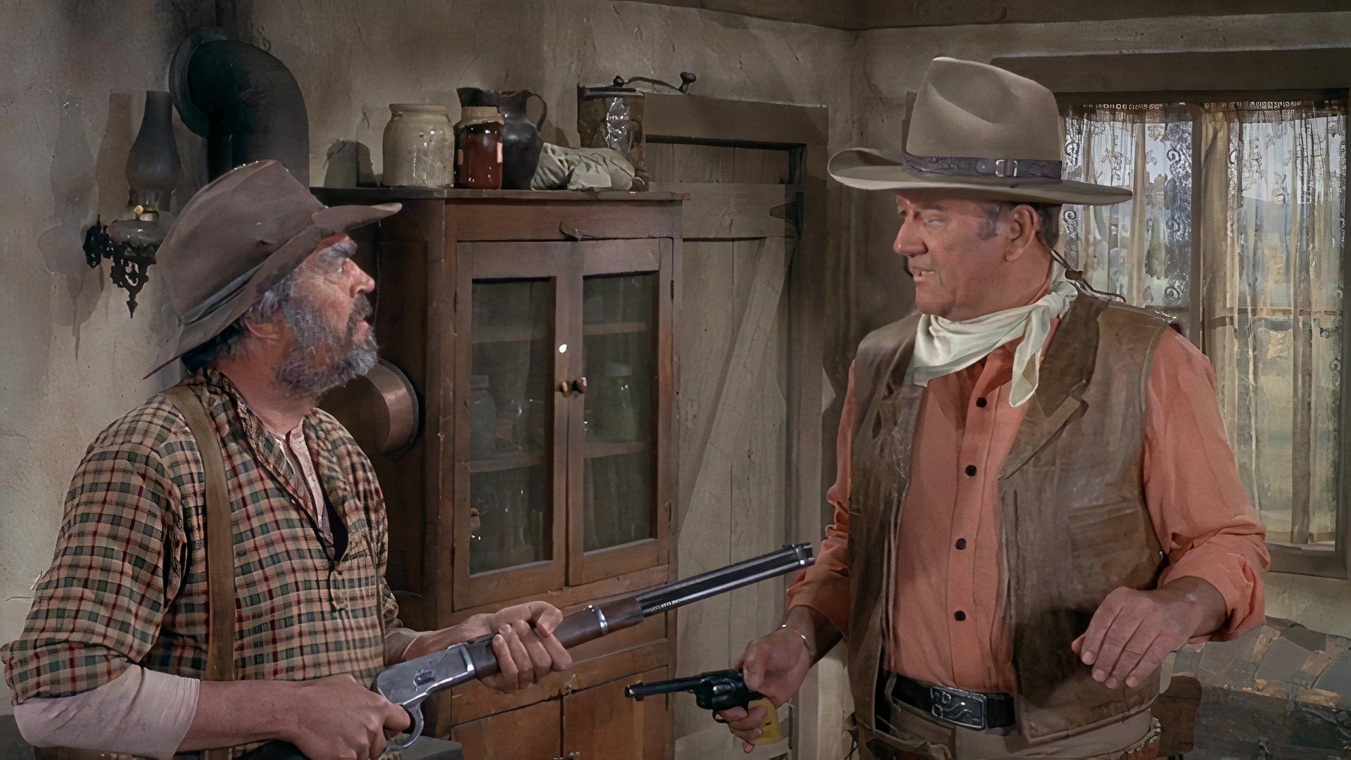 Kurd points gun at him in Rio Lobo