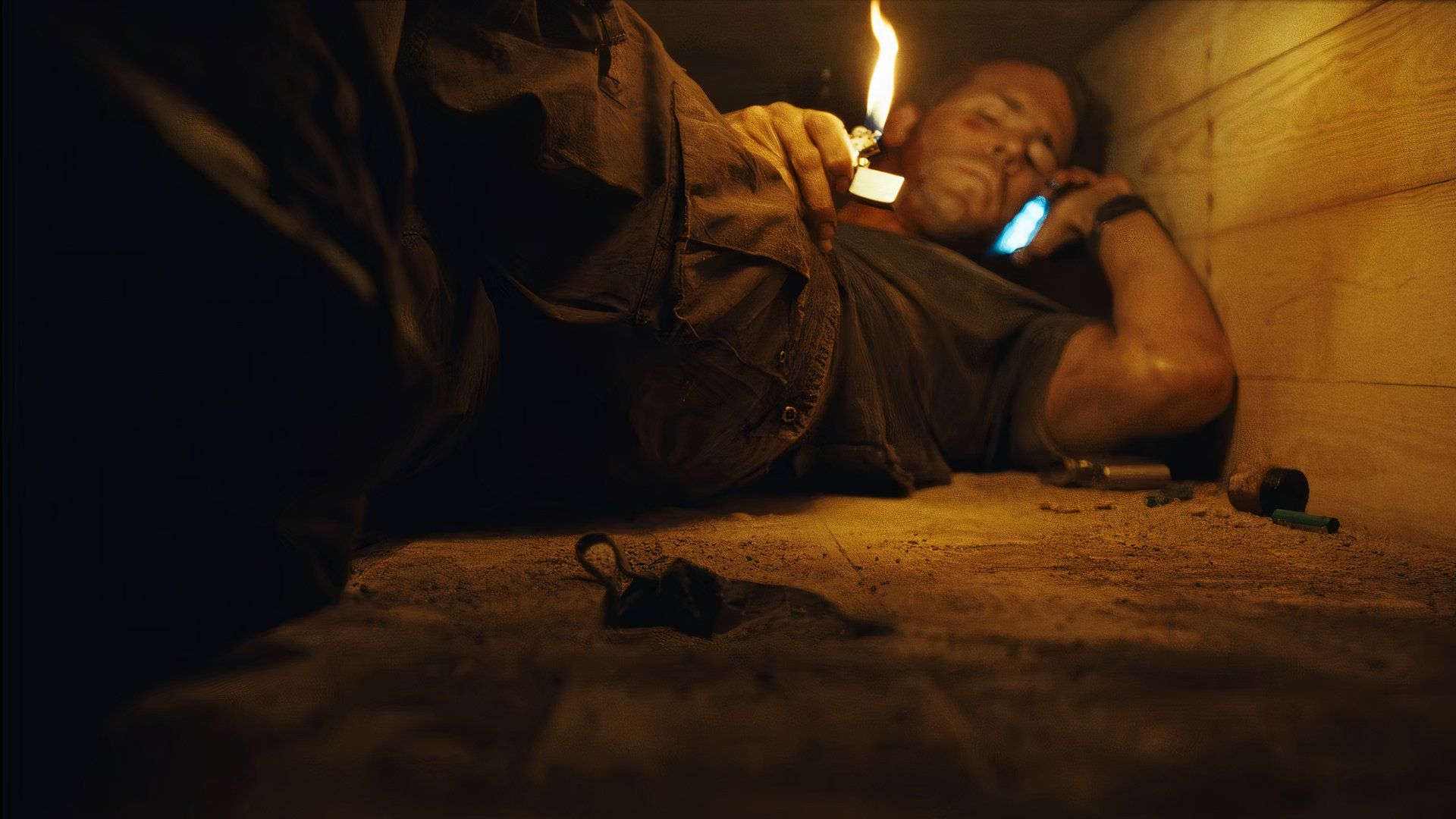 Ryan Reynolds using a lighter in a coffin in Buried