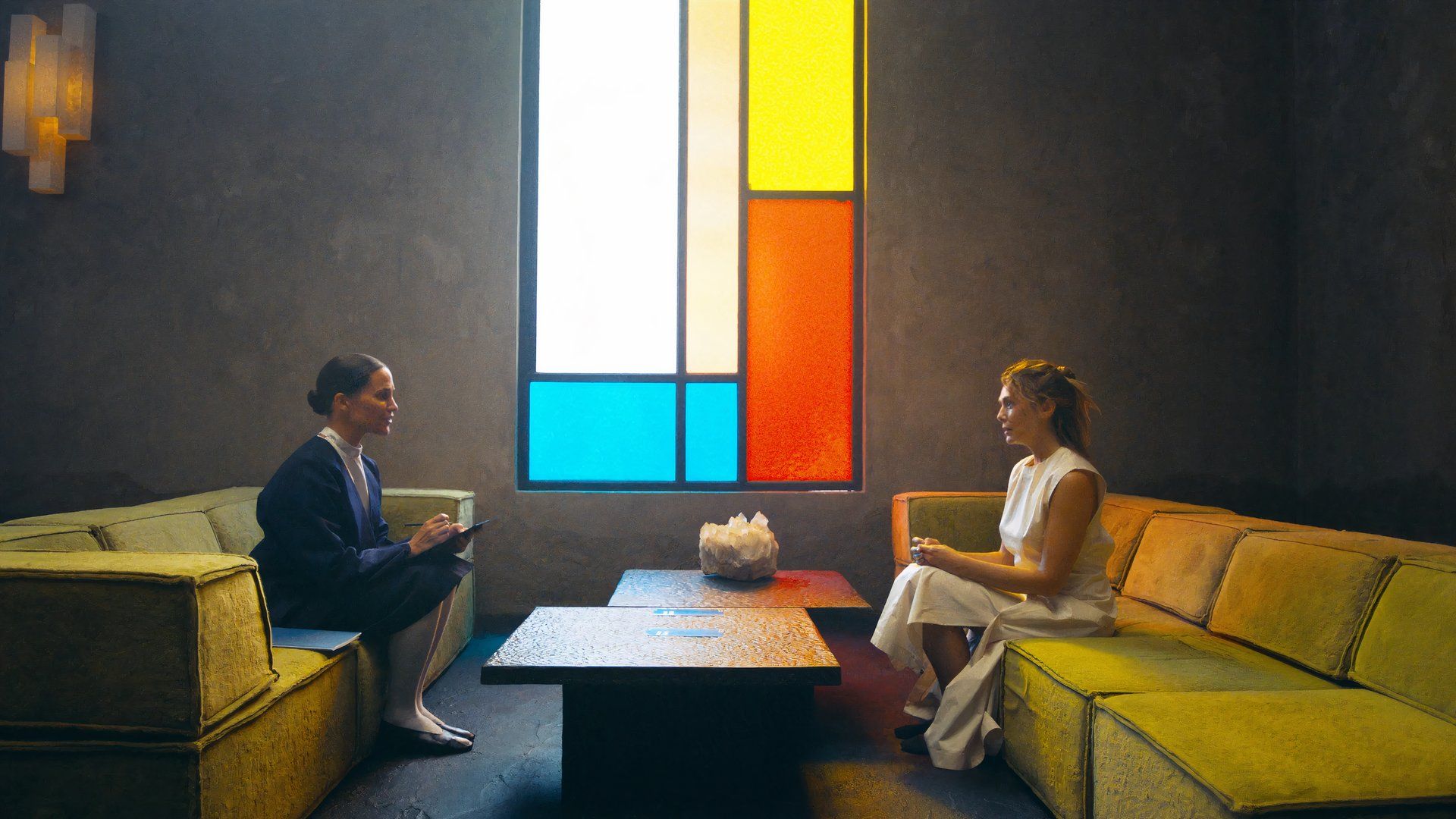 The Assessment with Alicia Vikander and Elizabeth Olsen sitting opposite each other by Mondrian stained glass in TIFF 2024