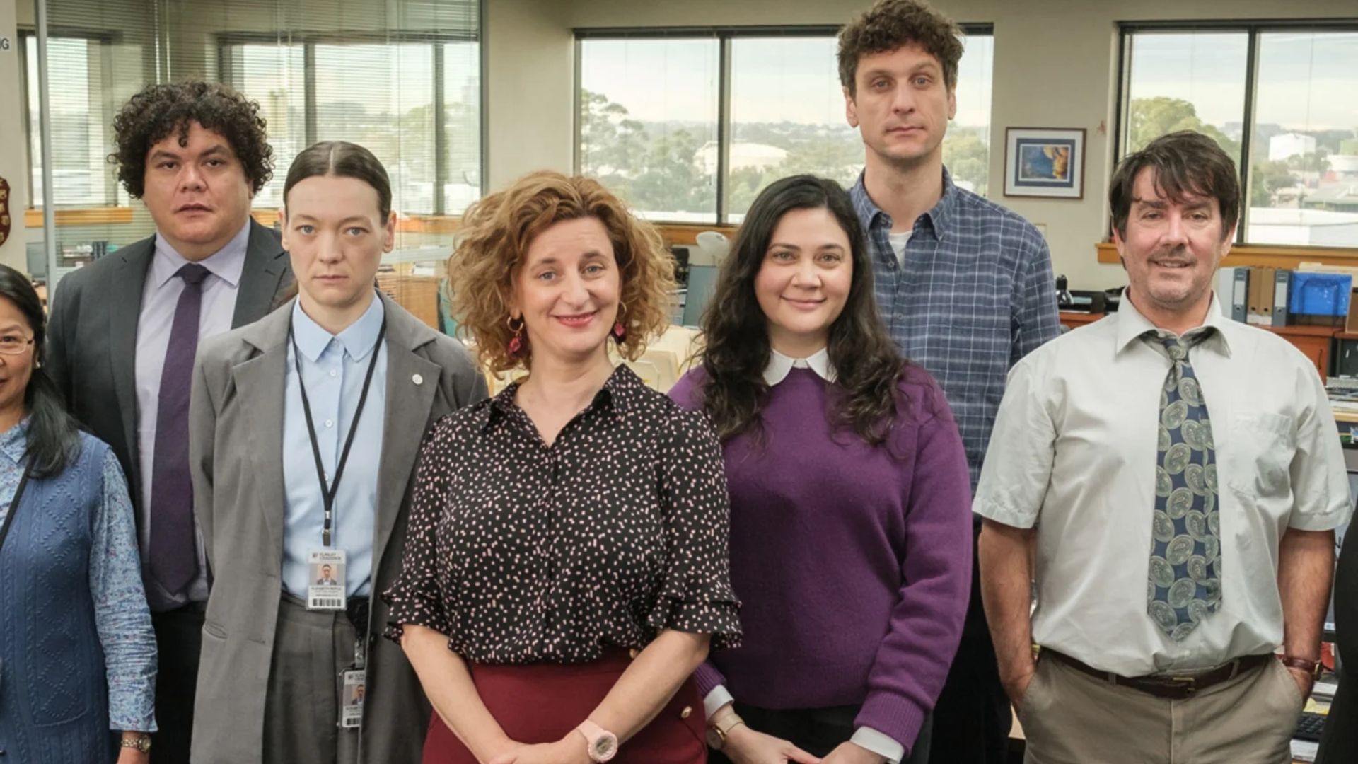 The cast of The Office Australia posing for a photo