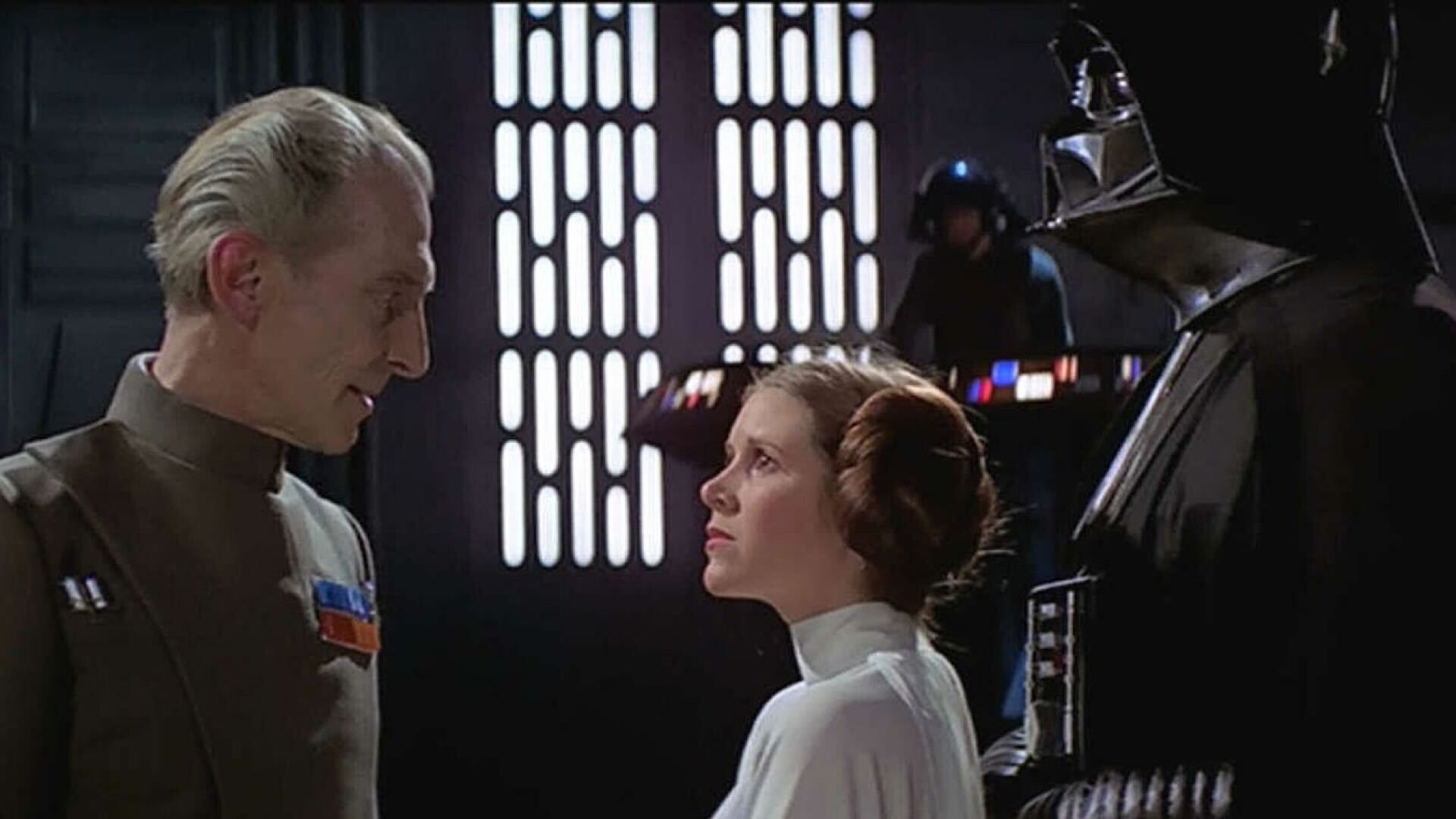 Peter Cushing as Grand Moff Tarkin with Leia and Vader