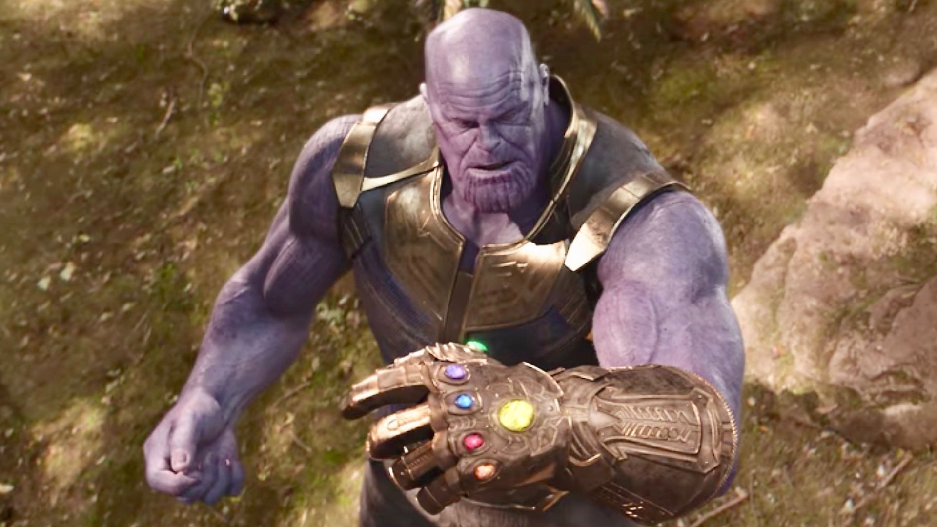 Thanos looking at his gauntlet in Avengers: Infinity War