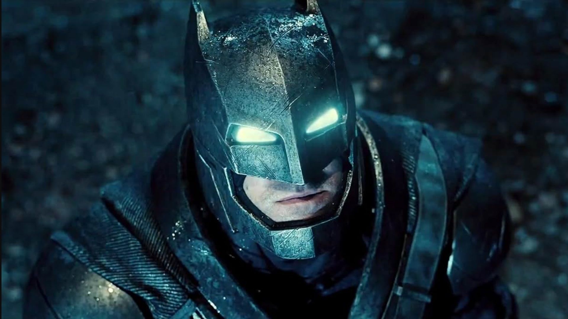 Ben Affleck as Batman in an armored suit.