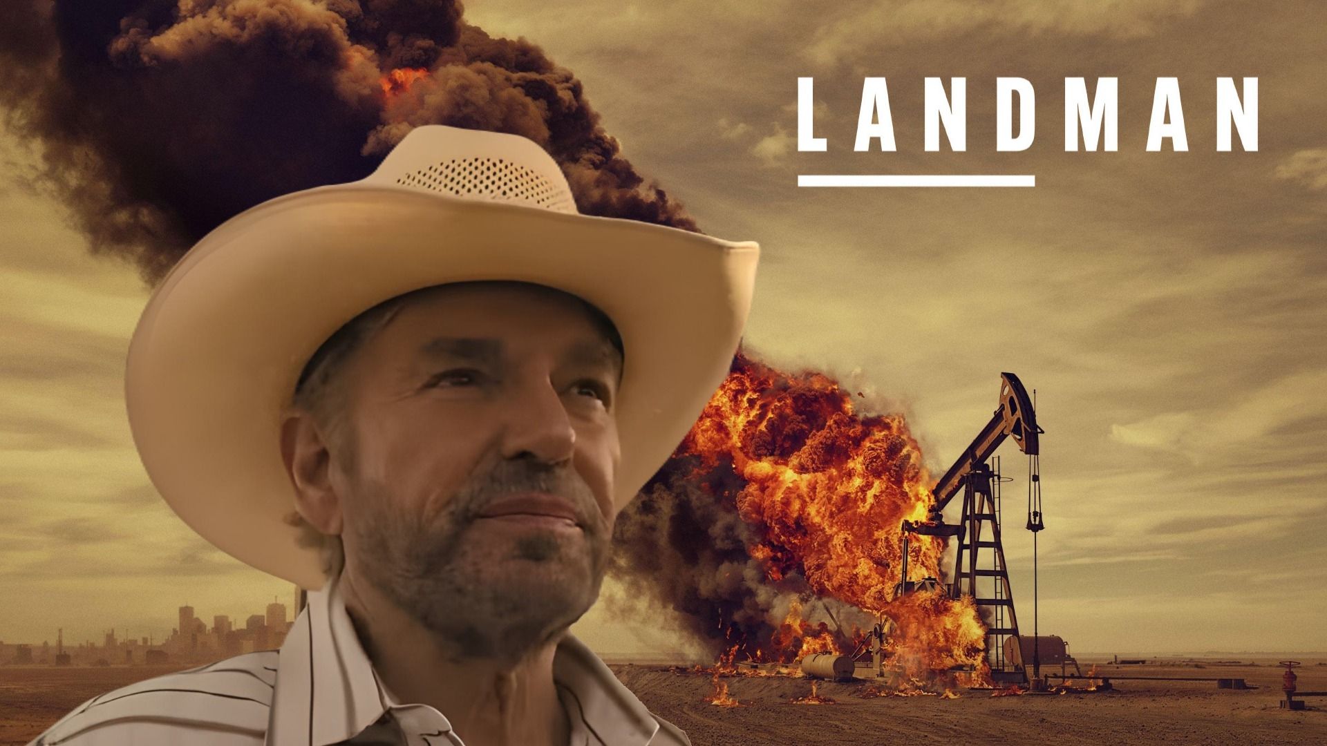 Billy Bob Thornton with a cowboy hat next to a burning oil rig in Landman