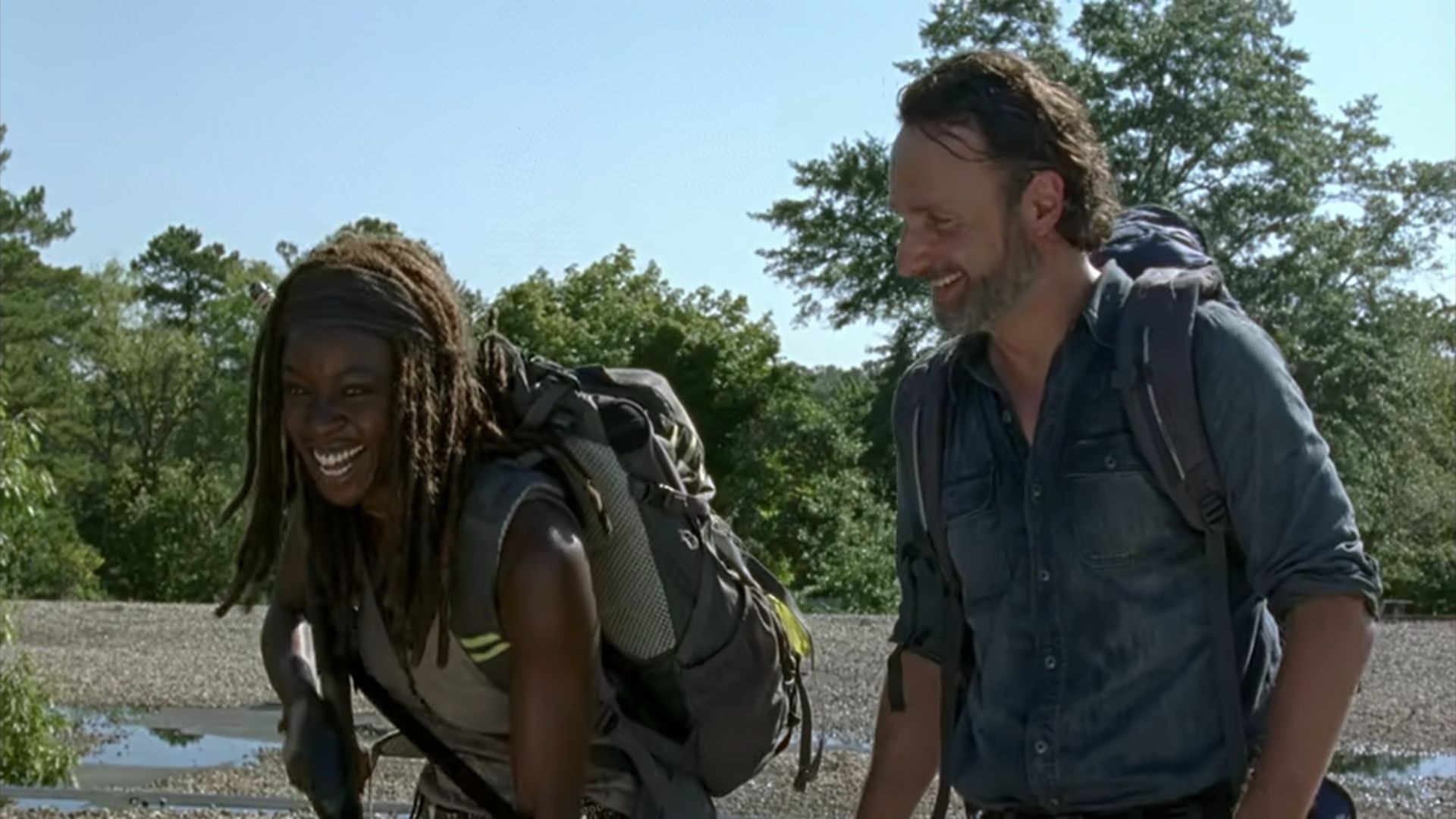 Rick and Michonne laughing in the Walking Dead episode "Say Yes."