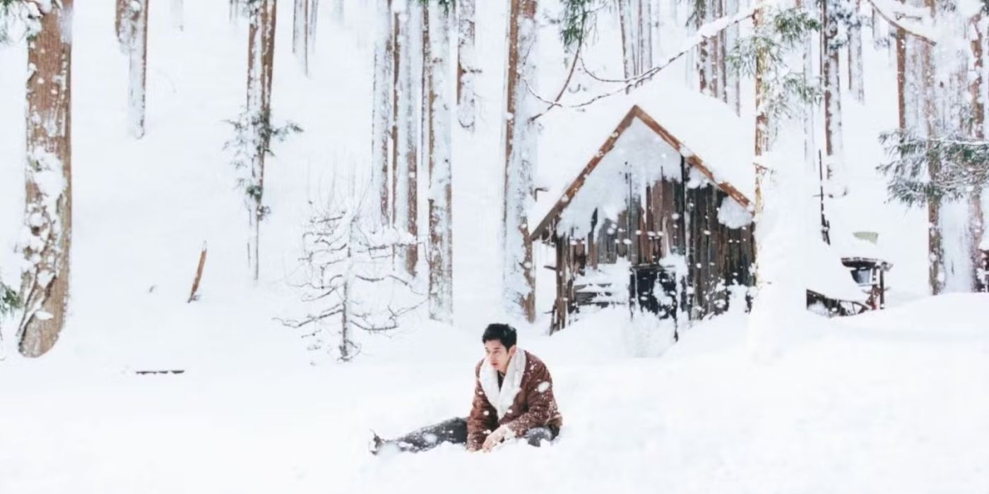 A man sits in the snow in Monsters Club