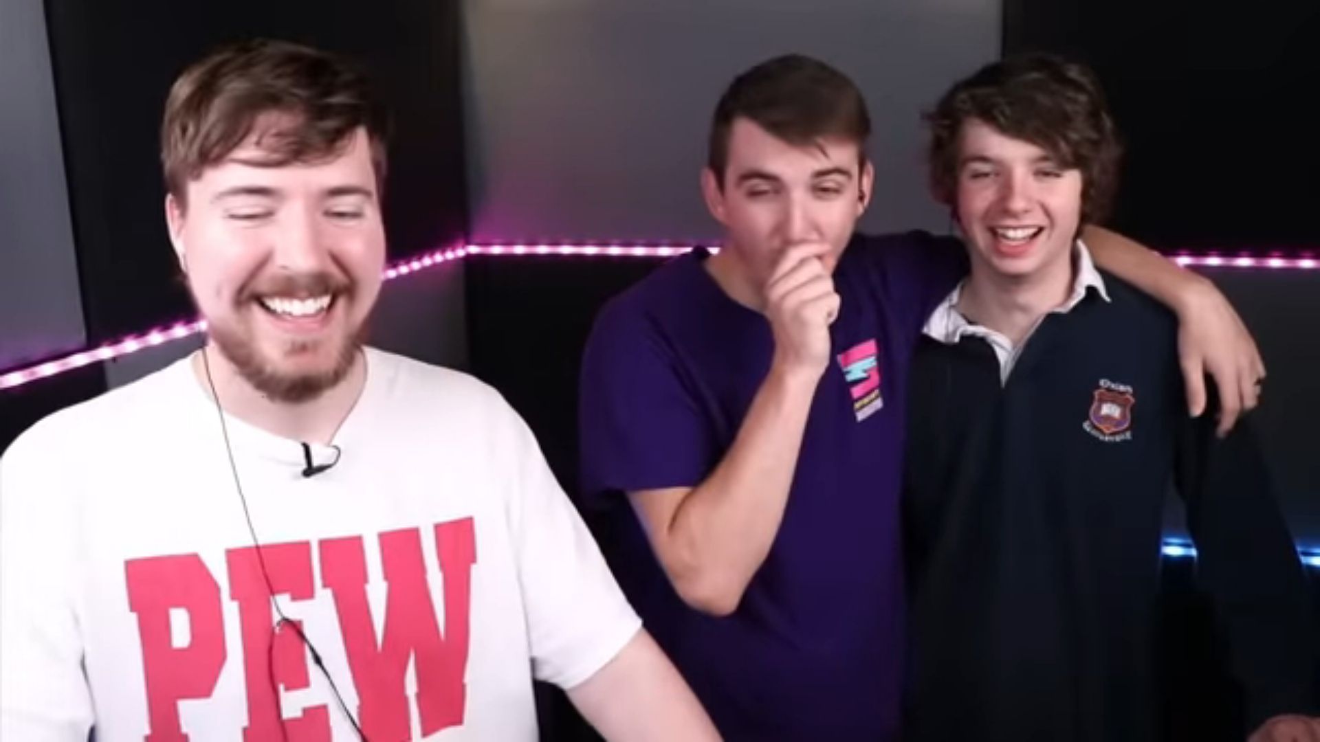 MrBeast, Ava, and Karl laughing during the Impossible Try Not to Laugh Challenge video.