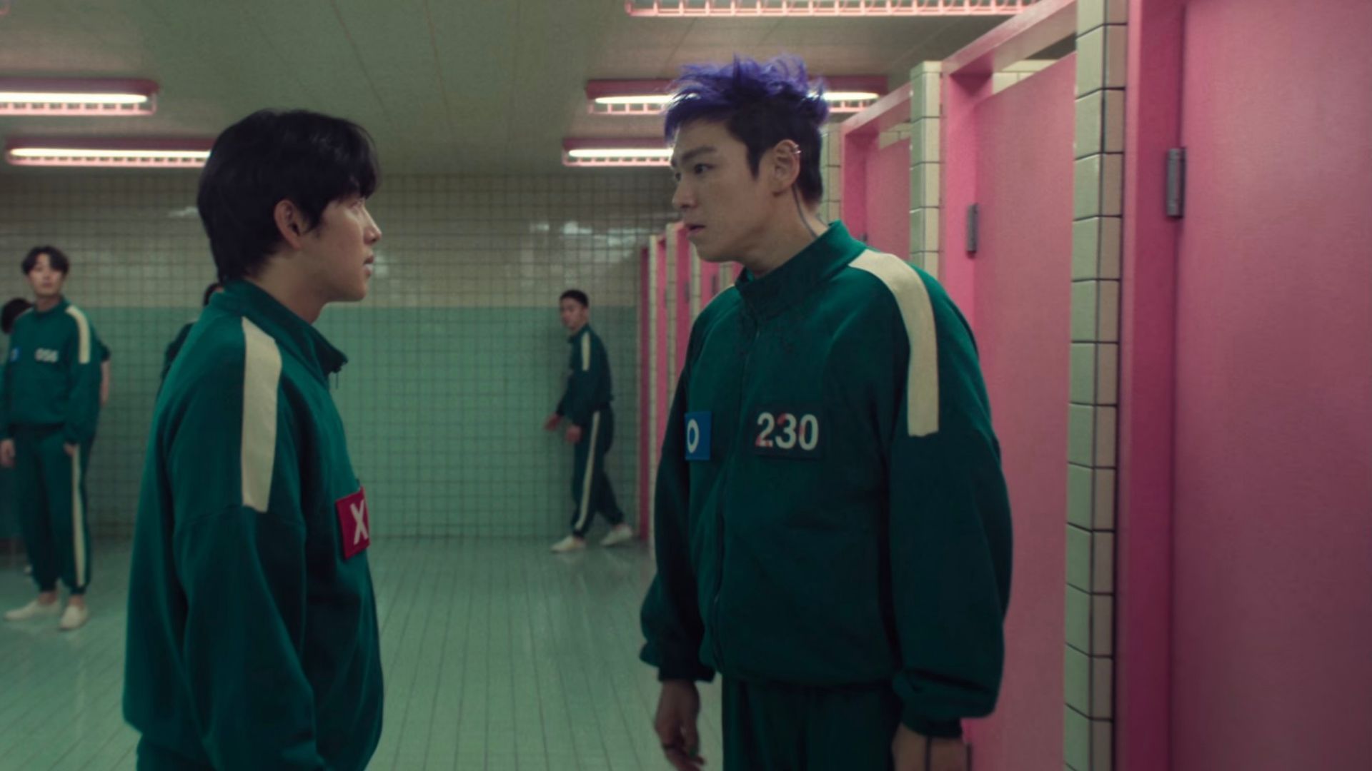 Thanos and Lee Myeong-gi during the bathroom brawl from Squid Game episode OX.