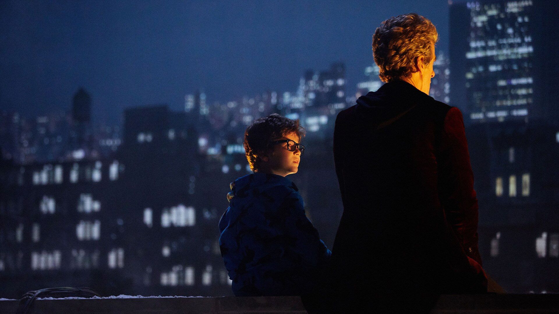 Peter Capaldi as the Doctor and Logan Hoffman as Young Grant in sci-fi TV series Doctor Who