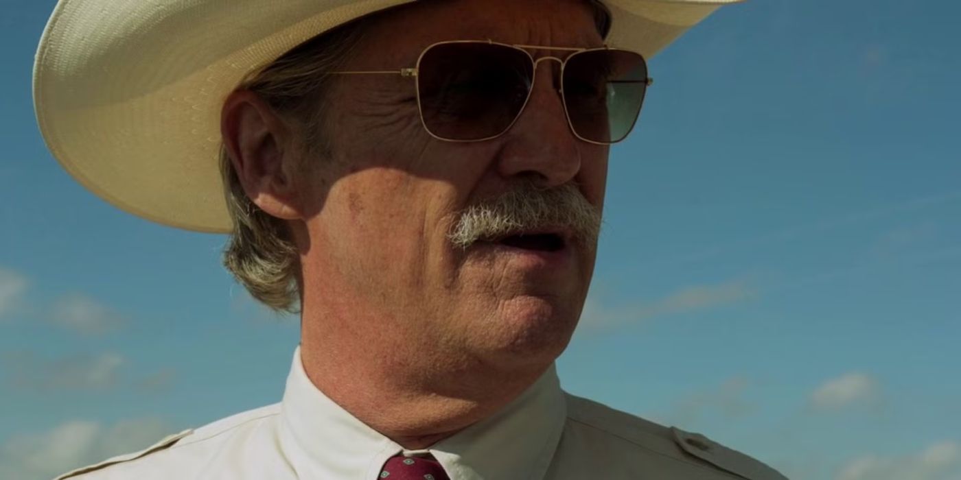 Close-up of Jeff Bridges in a cowboy hat and sunglasses in the movie Hell or High Water