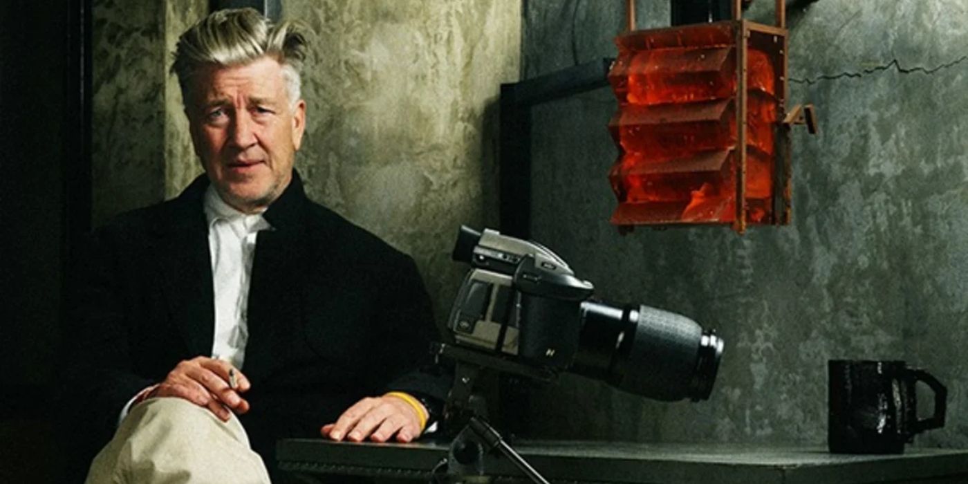 David Lynch smokes and sits next to a camera in The Art Life documentary about him