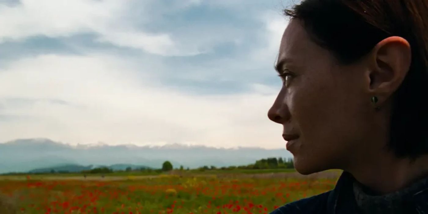 Ia Sukhitashvili as Nina looks at a Georgian field in the movie April at Sundance