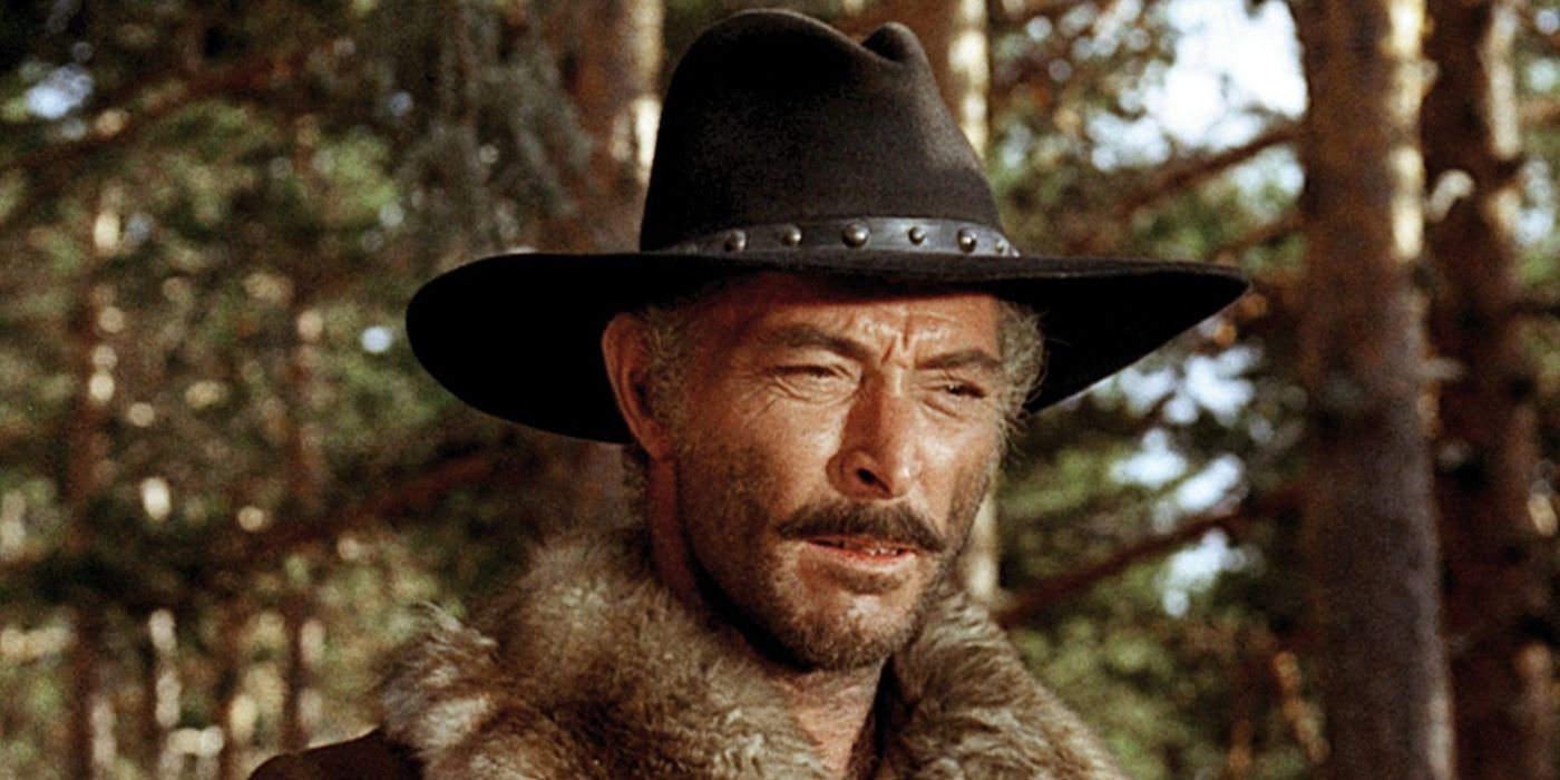     Lee Van Cleef wearing a cowboy hat and fur coat in a forest in The Big Gundown