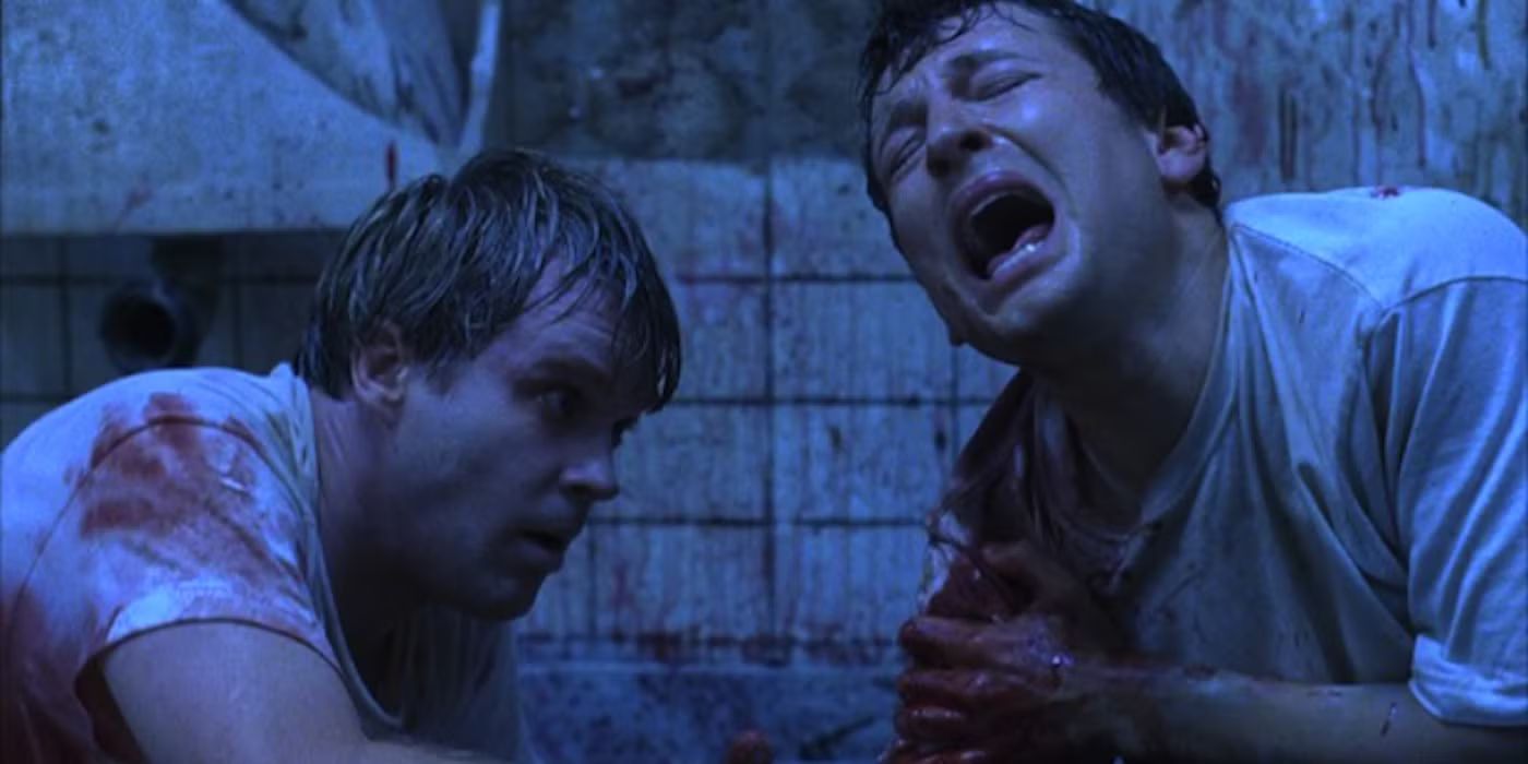 Leigh Whannell and Cary Elwes in Saw (2004)