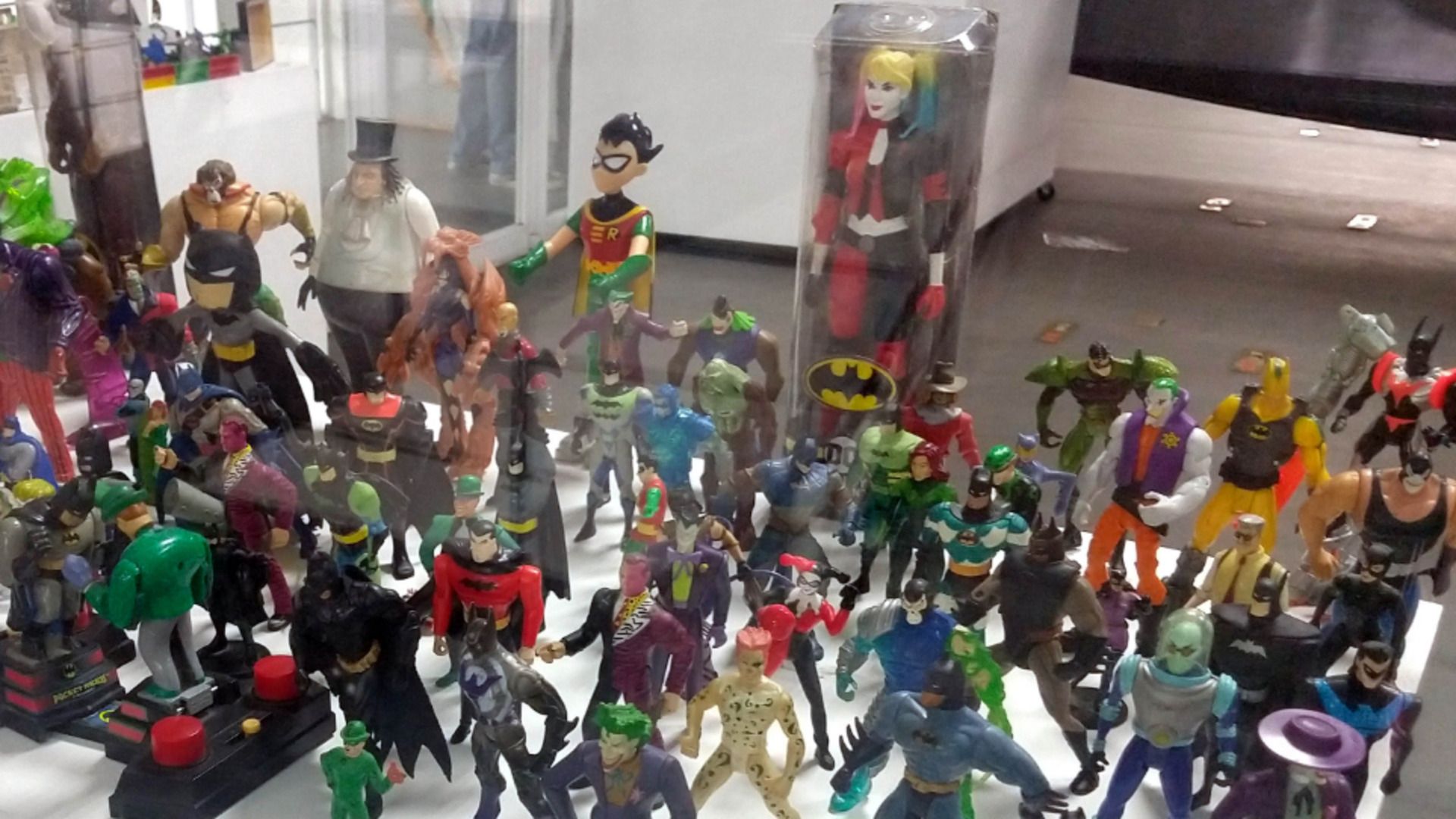 table of vintage superhero toy collection