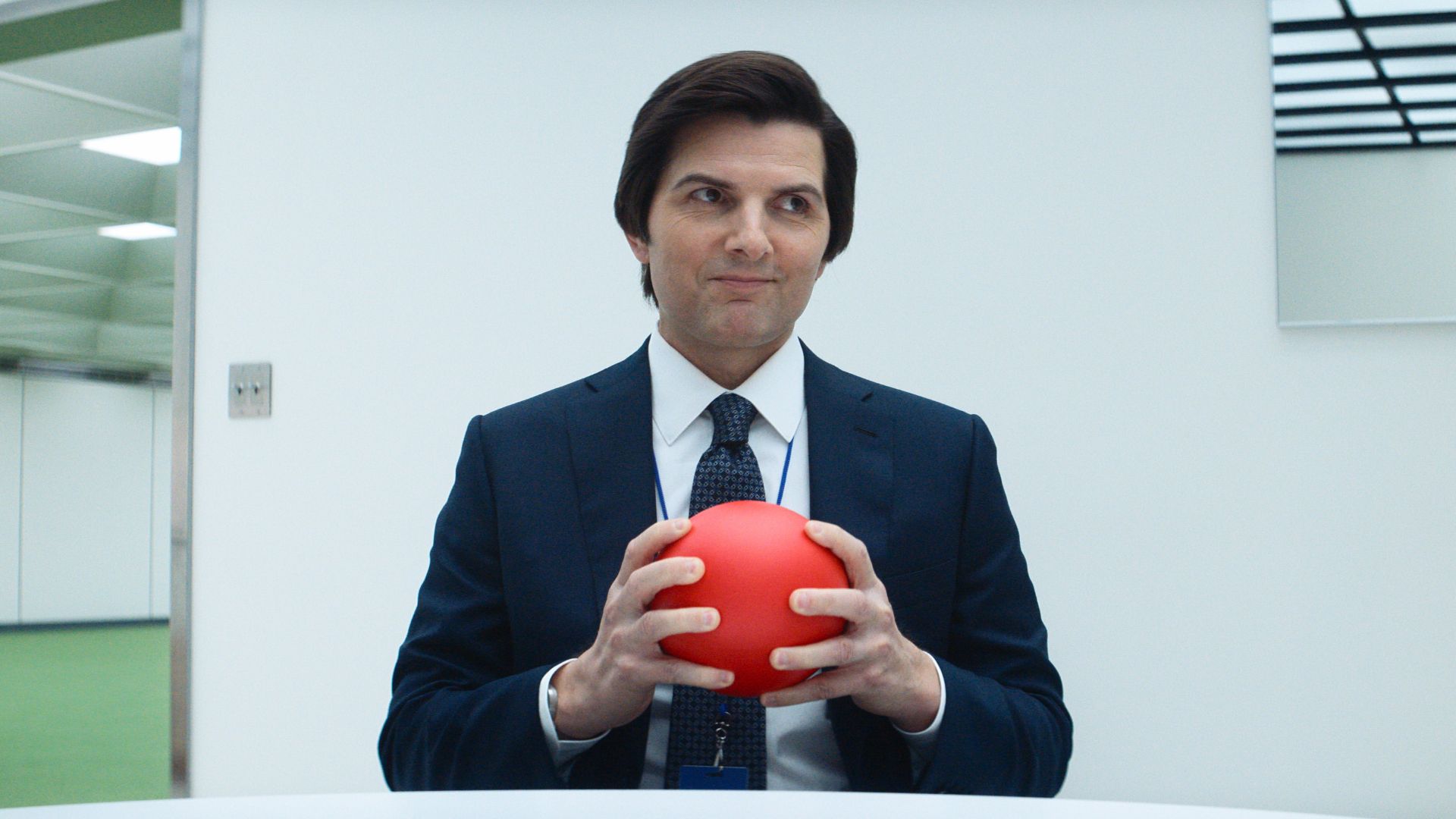 Severance Season 2 with Adam Scott as Mark holding a red ball