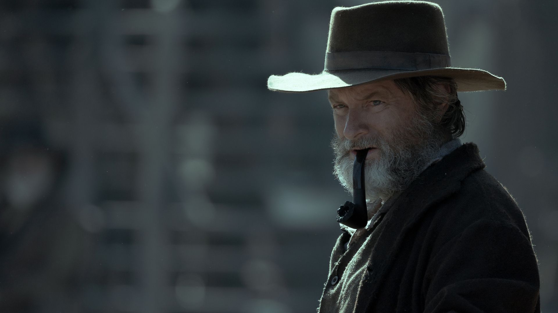 Shea Whigham with a pipe in the Netflix Western series American Primeval