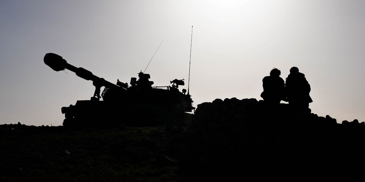 The silhouette of a tank and soldiers in the West Bank in the documentary film No Other Land