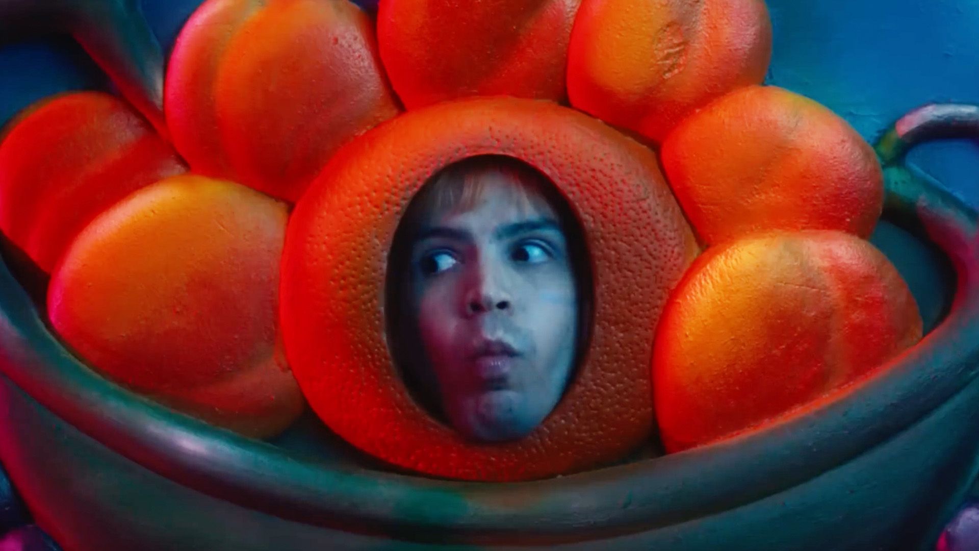 Julio (Julio Torres) as an orange in Fantasmas (2024)