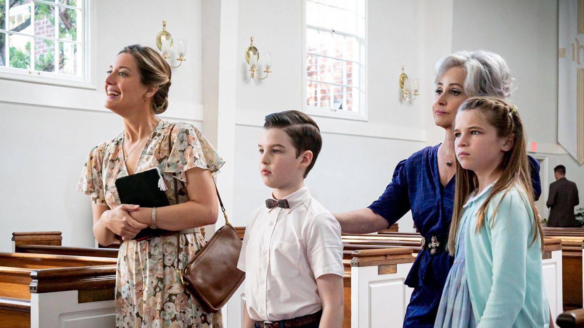 Mary, Sheldon, Connie, and Missy in church on Young Sheldon.