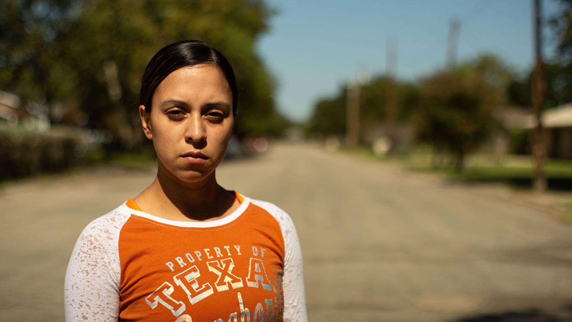 A young woman in the road in the movie Uvalde Mom