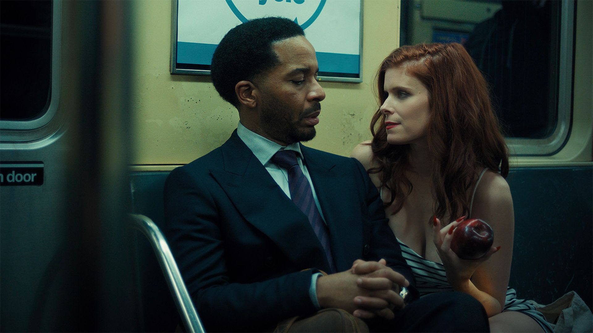 Andre Holland and Kate Mara on a subway train in The Dutchman