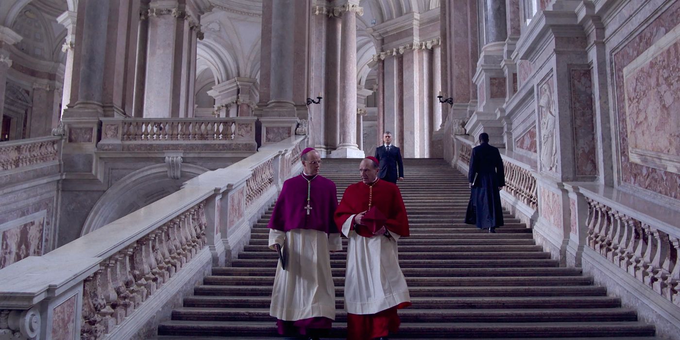 Cardinals walk down the stars in the Vatican set in Conclave built by Paolo Sorrentino for The Young Pope
