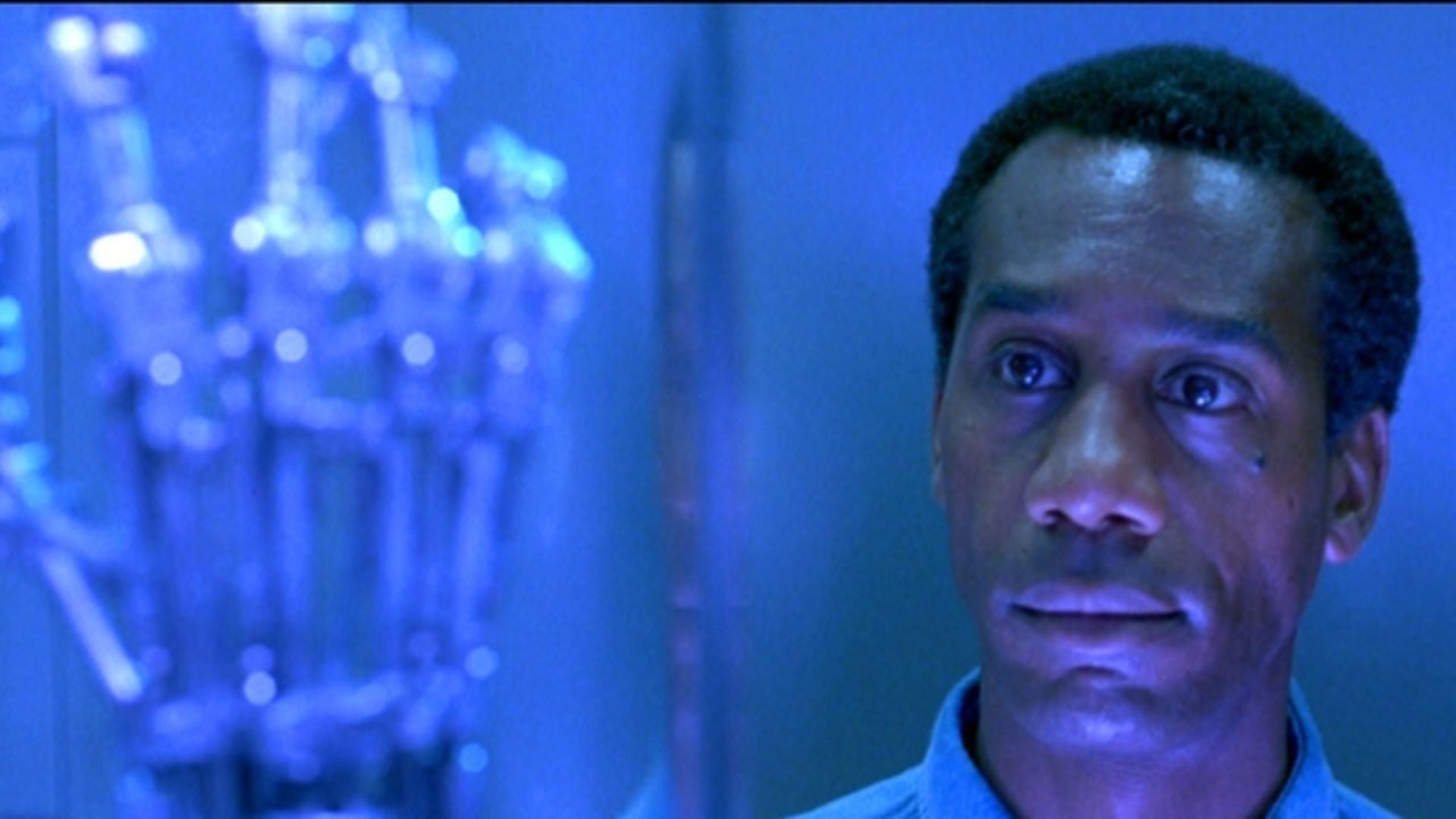 Joe Morton looking at the terminator hand in T2 Judgment Day