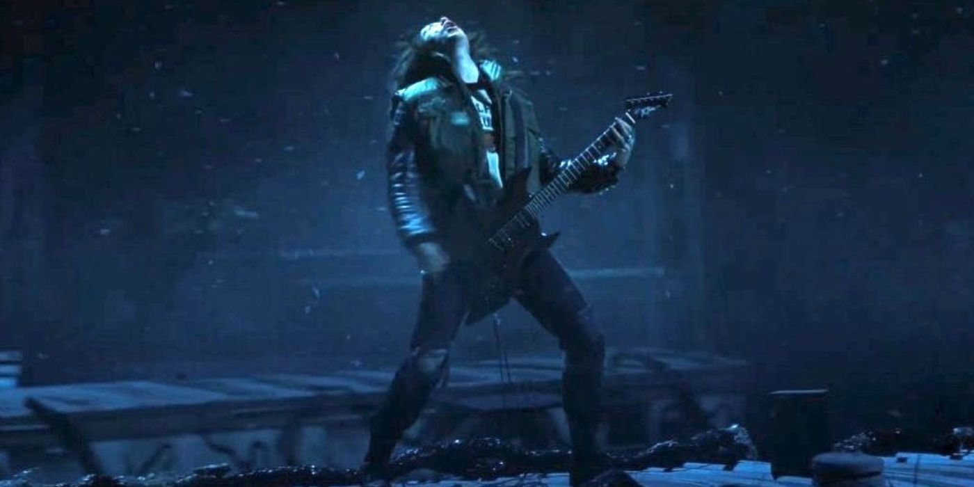 Joseph Quinn as Eddie Munson in 'Stranger Things,' Season 4, Episode 9 playing the guitar