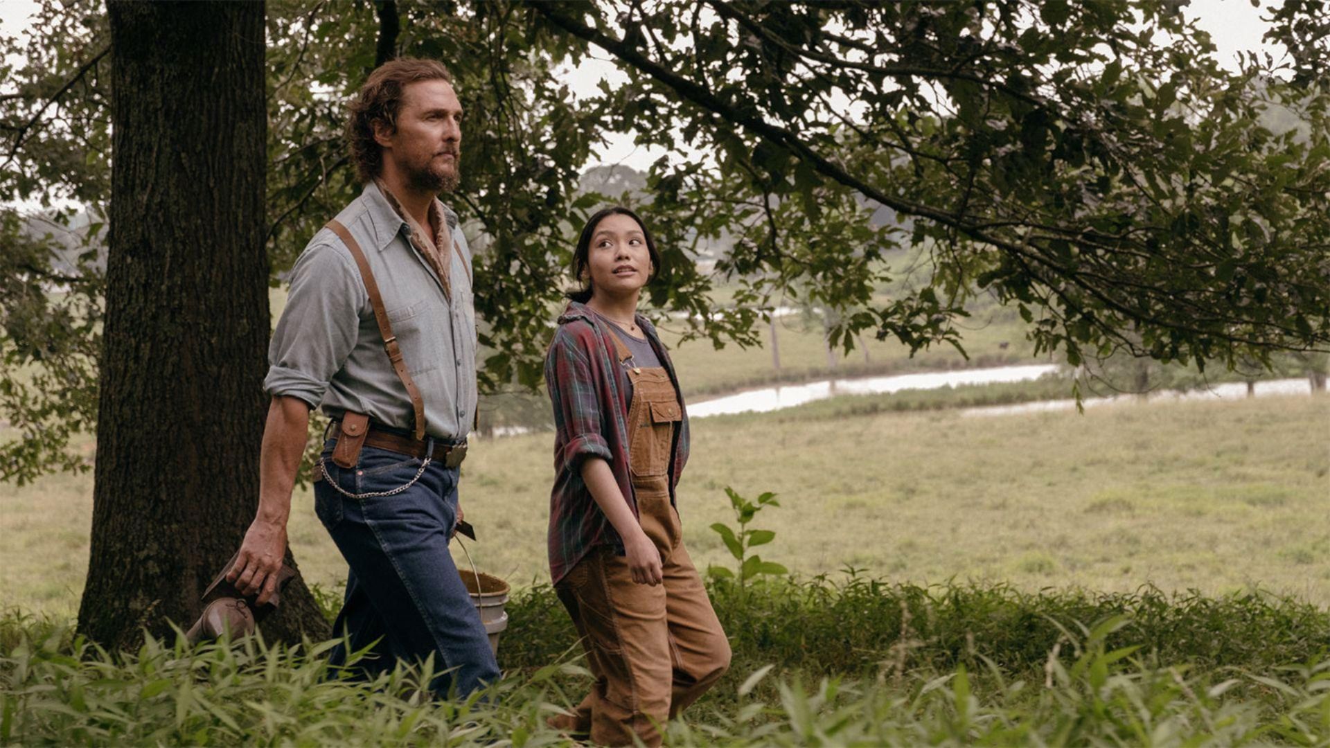 Matthew McConaughey walks through the grass in The Rivals of Amziah King