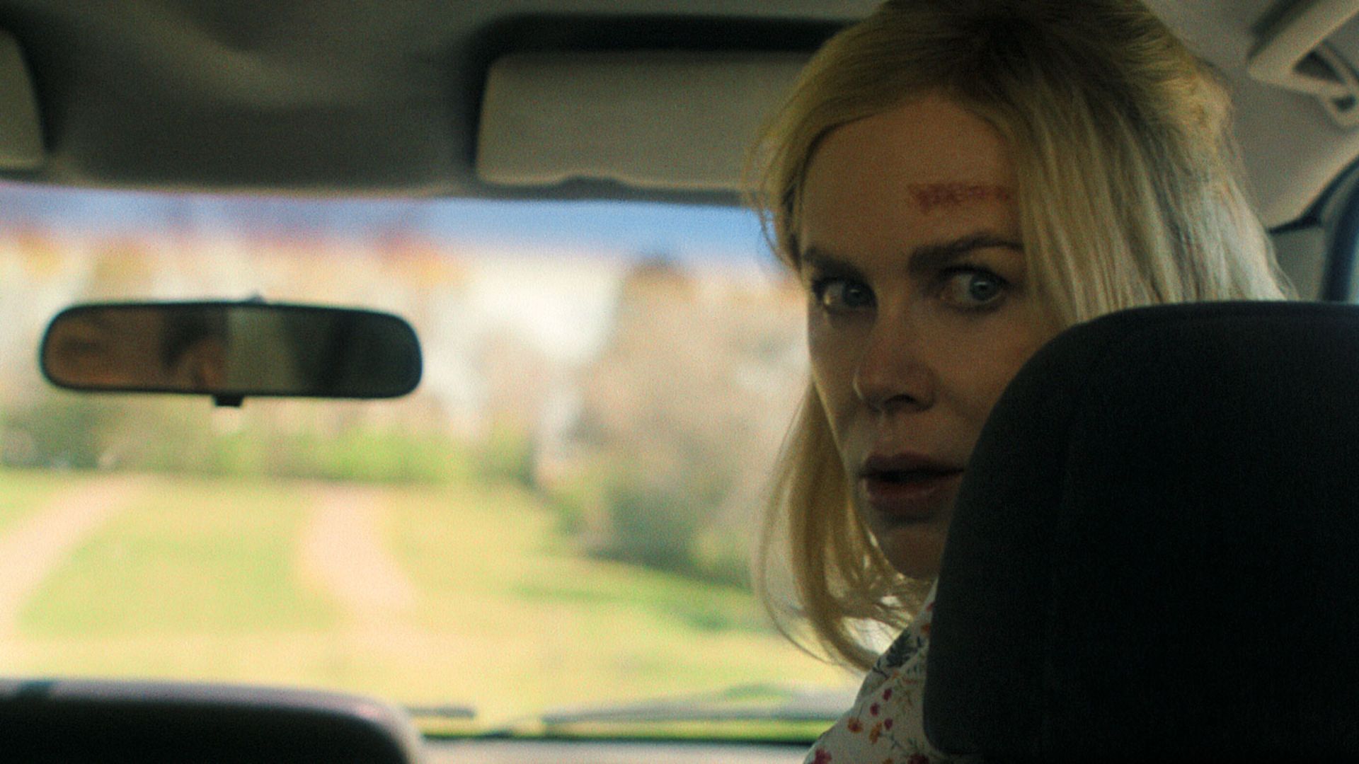 Nicole Kidman in a car seat in the movie Holland