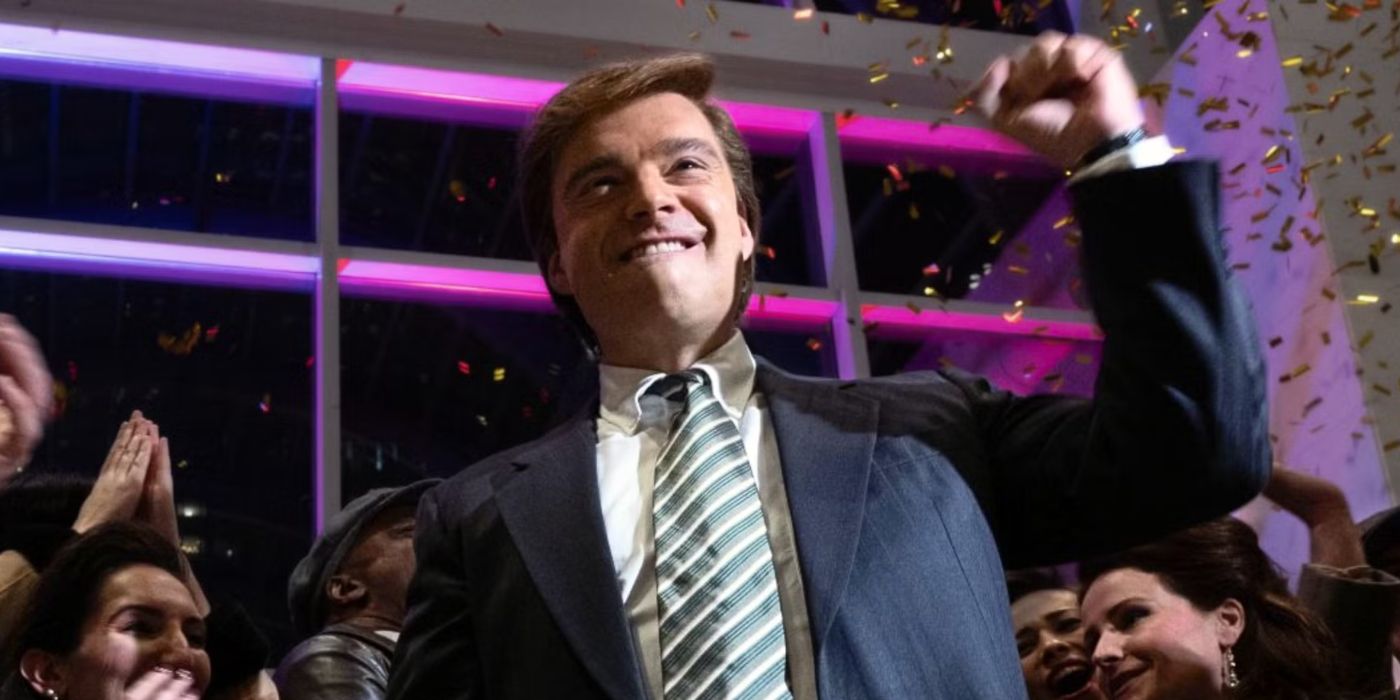 Sebastian Stan as Donald Trump in The Apprentice celebrating with his hand in the air