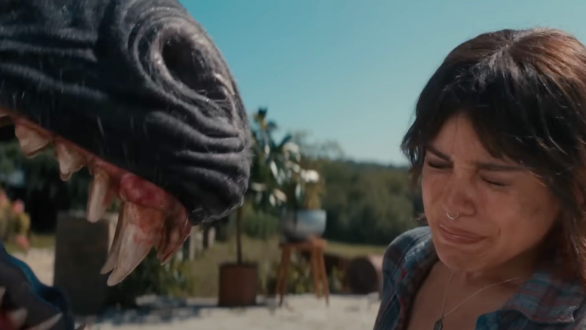 A snarling unicorn in Death of a Unicorn with Jenna Ortega