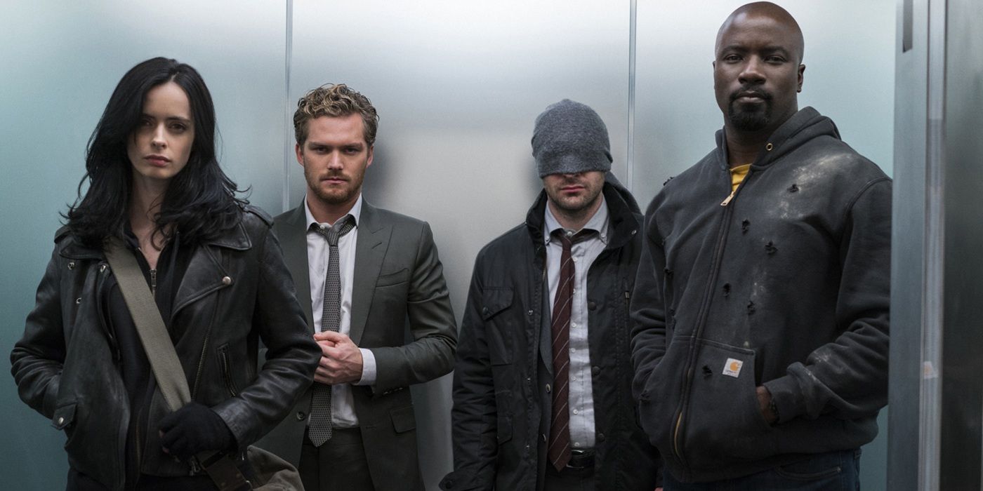 The Defenders cast standing in an elevator