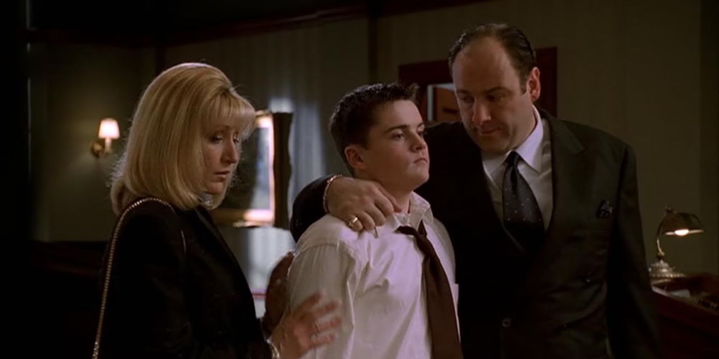 Carmela (Edie Falco), A.J. (Robert Iler), and Tony Soprano (James Gandolfini) at the wake for Livia Soprano in The Sopranos