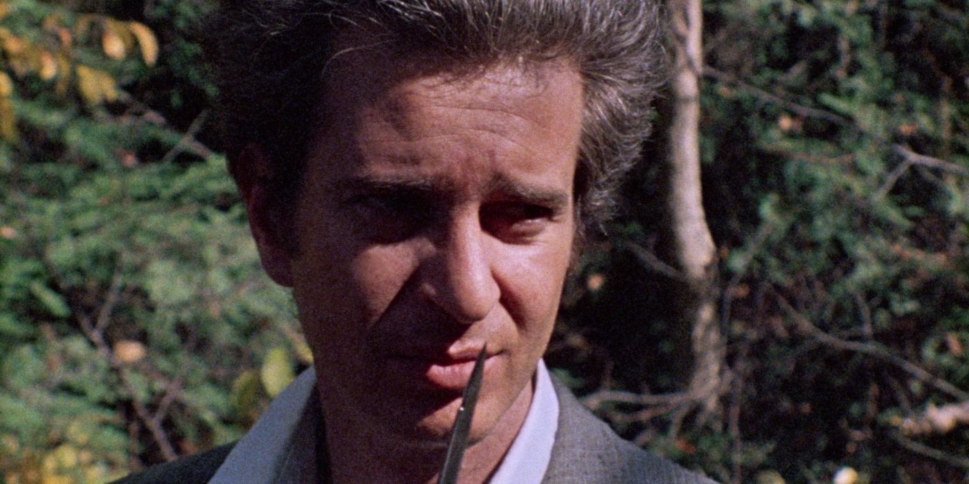 A man with a knife in The Last House on the Left