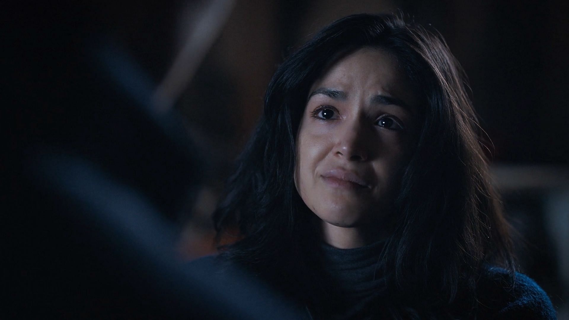 Amelia looking at Colter, terrified in Tracker