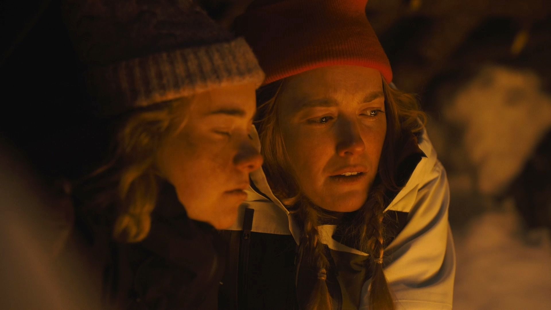 Shelly and Brianna huddled together trying to keep warm in Tracker