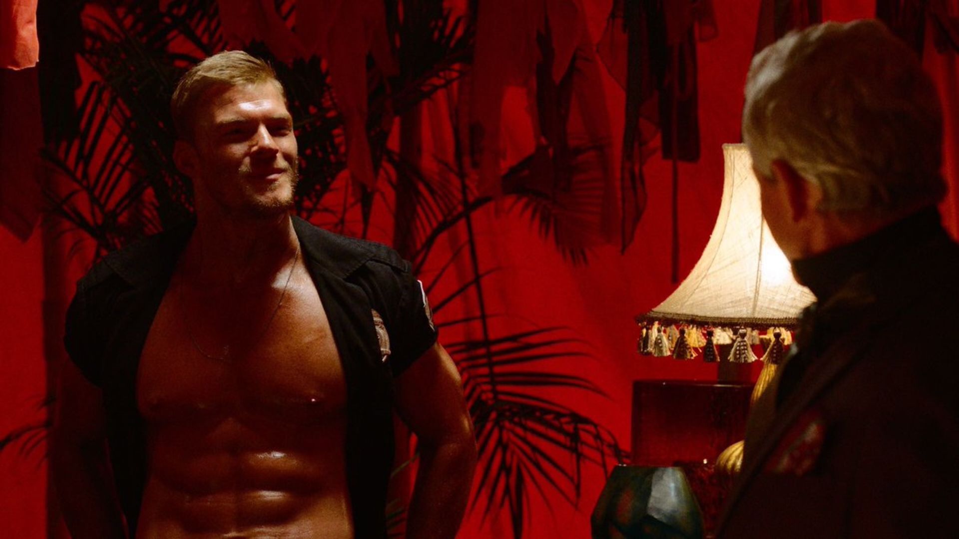 Barbie flashes his abs in Blood Drive