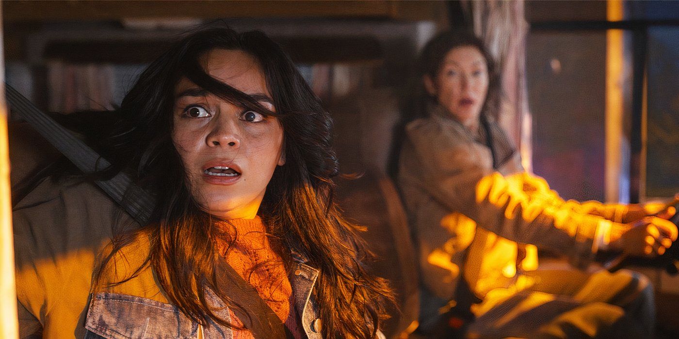 A still of Stefani (Kaitlyn Santa Juana) and her mom Darlene (Rya Kihlstedt) driving as a log truck almost hits them in Final Destination Bloodlines.