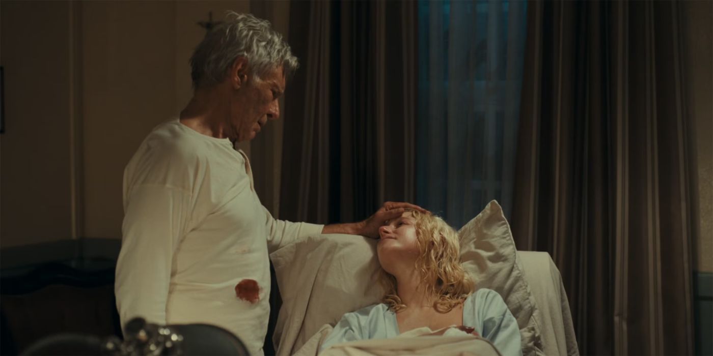 Jacob (Harrison Ford) comforts Alex (Julia Schlaepfer) as she gives birth in '1923'
