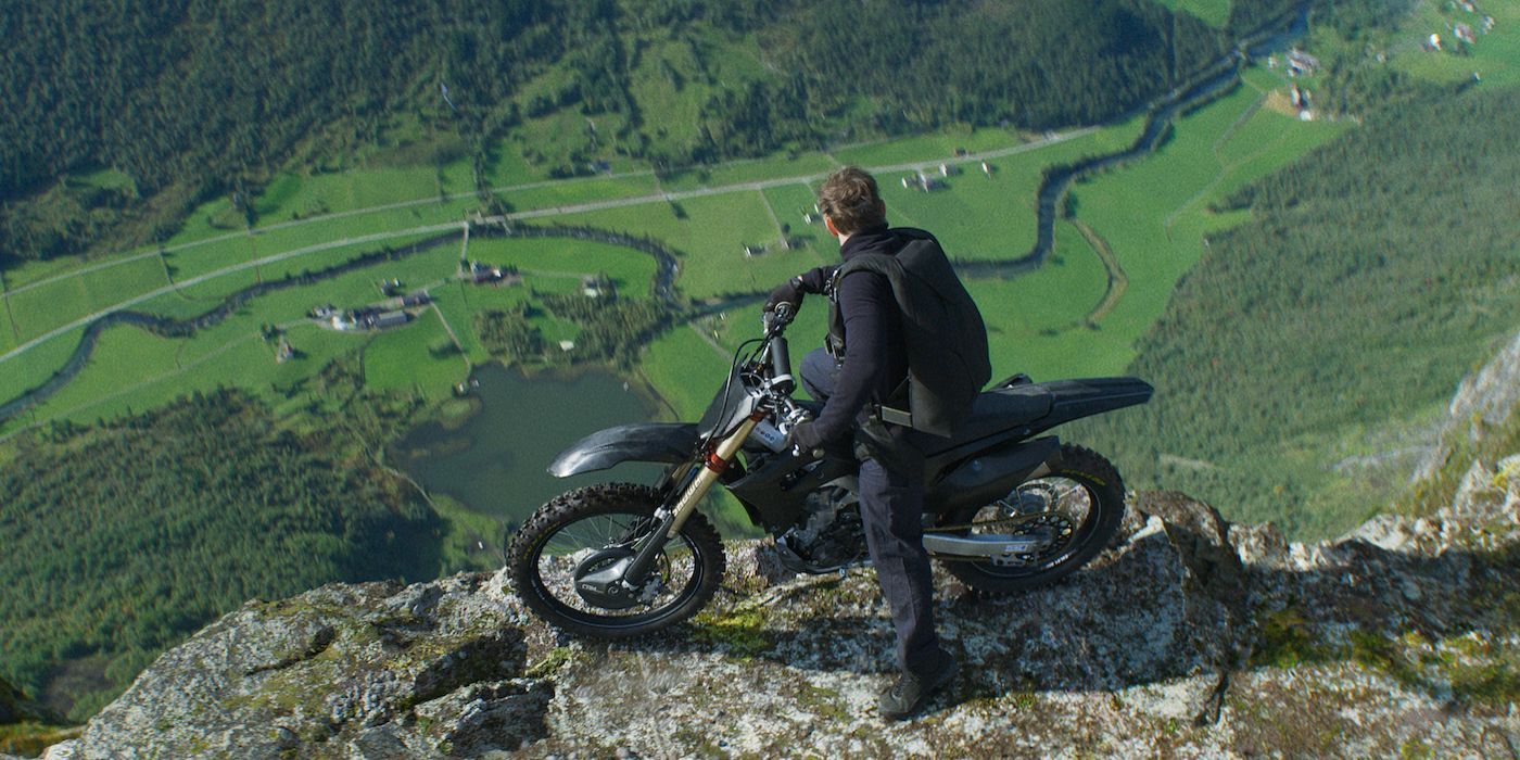 Tom Cruise prepares to jump a motorcycle off a cliff in Mission: Impossible – Dead Reckoning