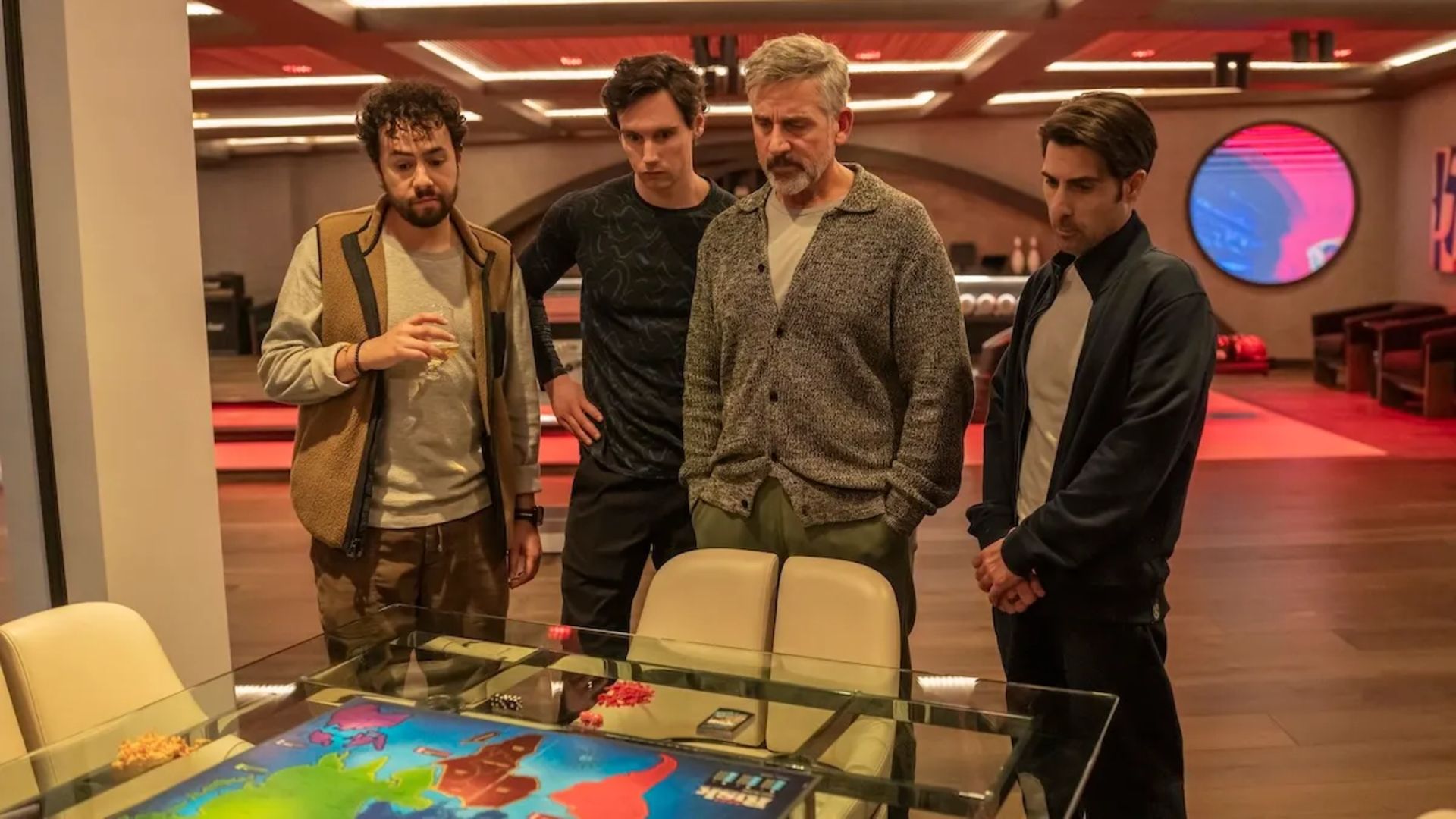 The gang looks at a game of Risk in Mountainhead