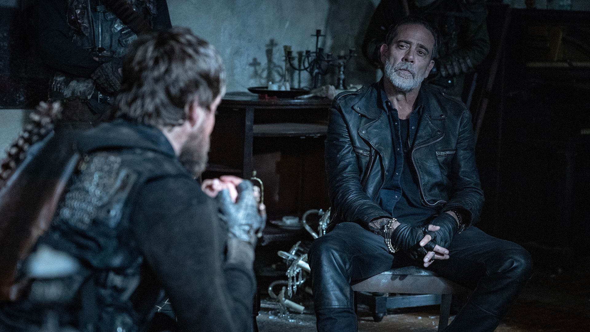 Negan sitting down with Christos in The Walking Dead: Dead City