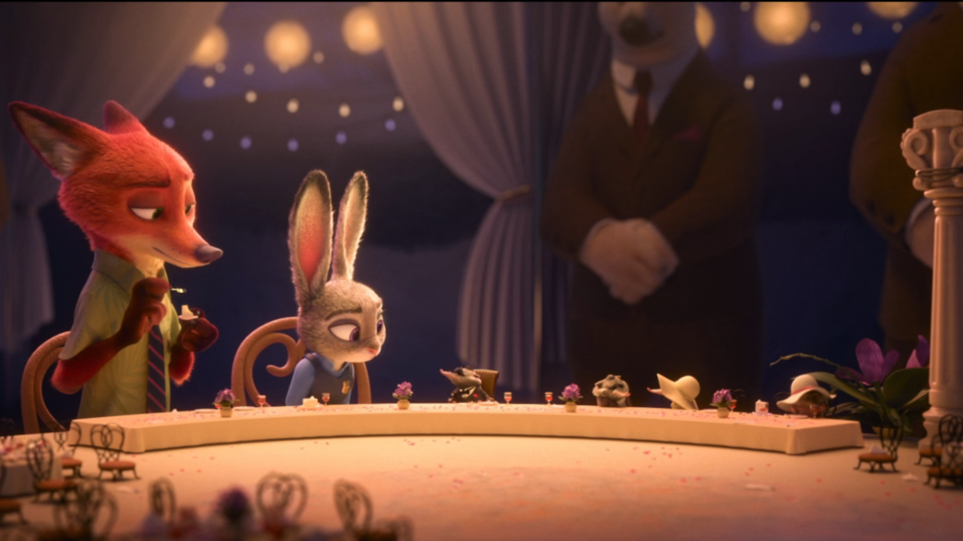 Judy, Nick, and Mr. Big at his daughter's wedding in Zootopia.