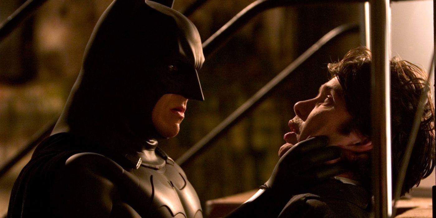 batman holds the scarecrow in batman begins
