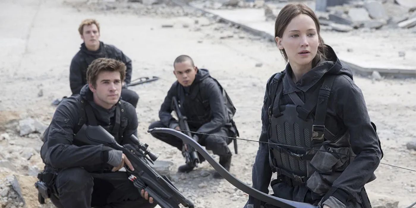 Jennifer Lawrence and Luke Hemsworth in The Hunger Games: Mockingjay – Part 2